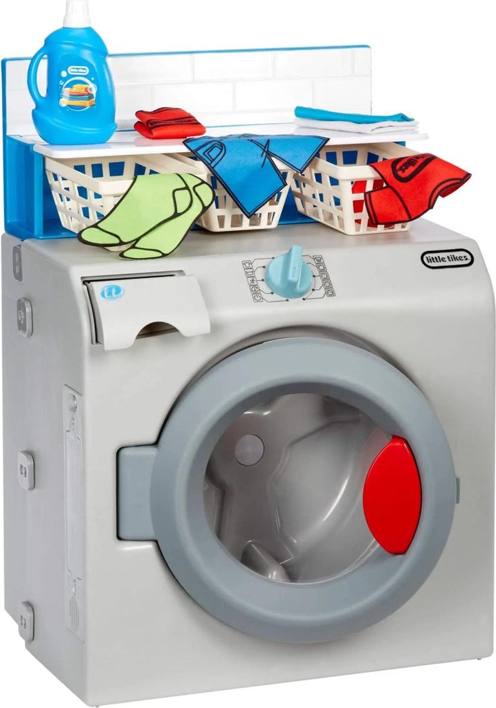 A toy washing machine with laundry accessories.