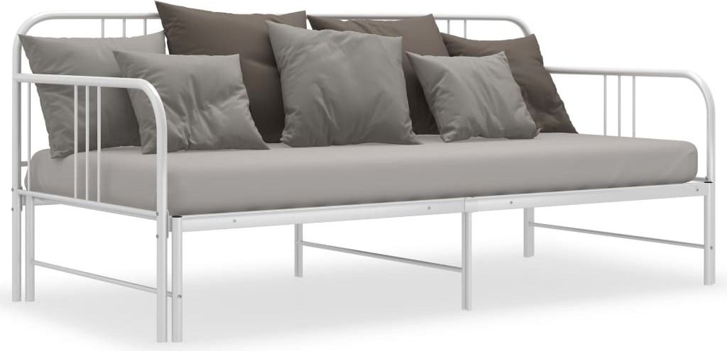 A white metal daybed with several pillows on it, shown against a white background.