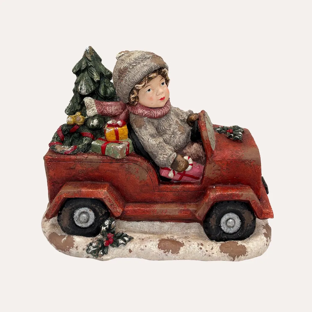 Figurine enfant voiture en résine pour créer une ambiance Noël magique