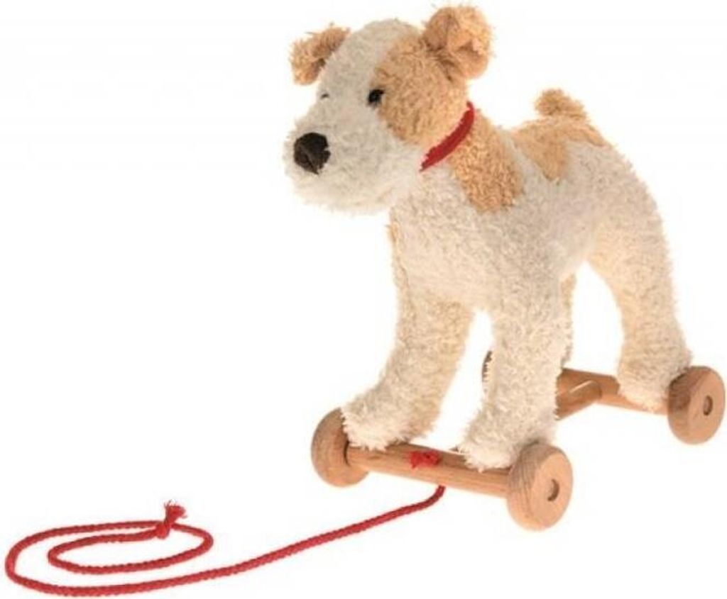 A plush toy dog on wooden wheels with a red pull string against a white background.