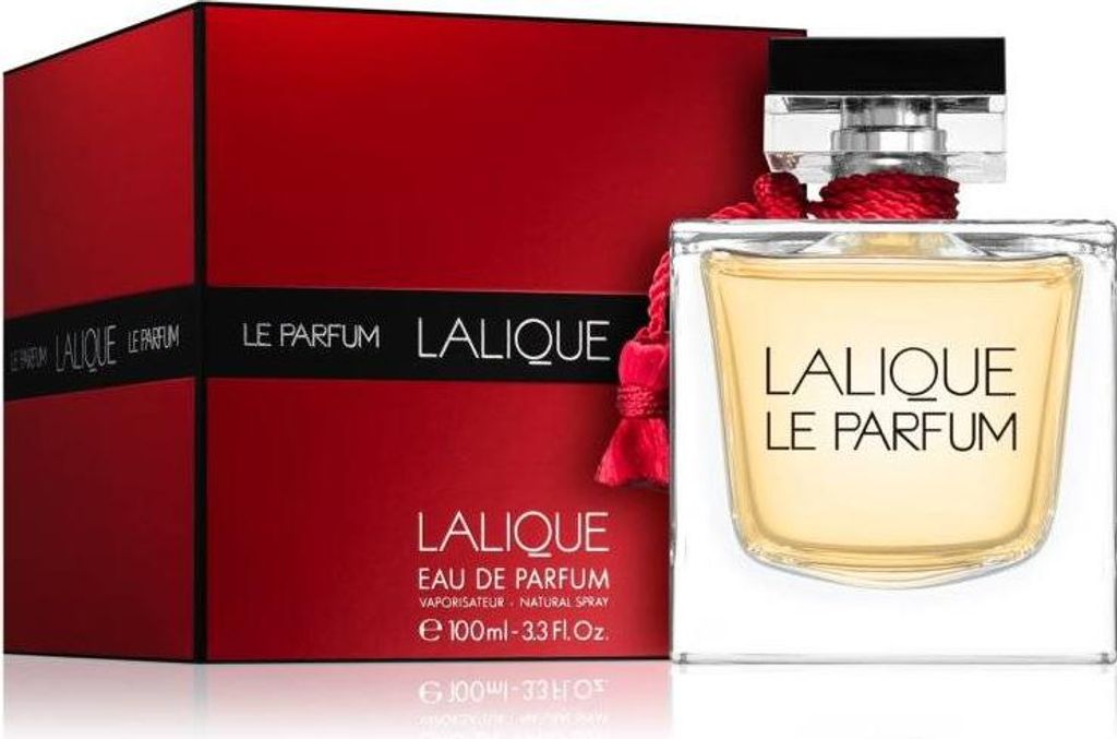 A perfume bottle and its box are displayed against a white background.