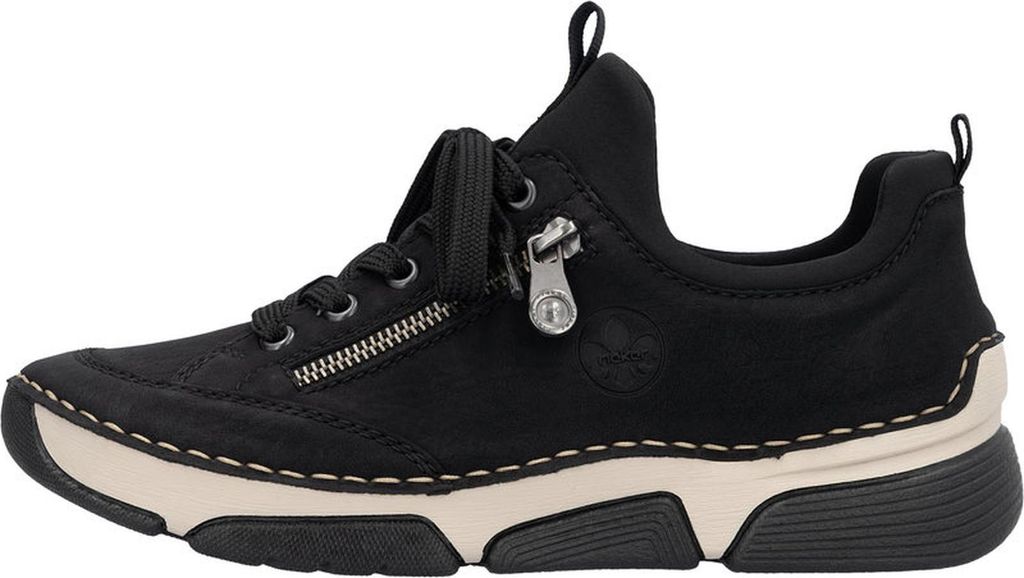 A side view of a black sneaker with a beige sole.