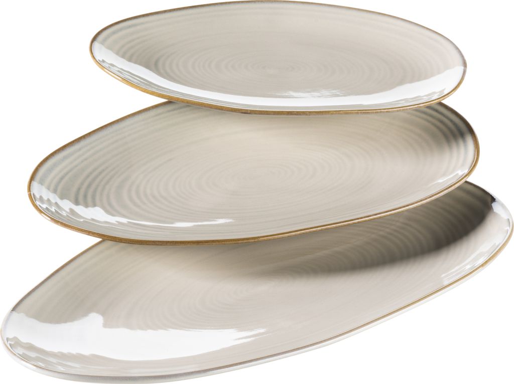 Three oval-shaped serving platters stacked on top of each other against a white background.