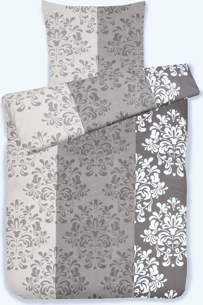 A top-down view of a bedding set laid out flat.
