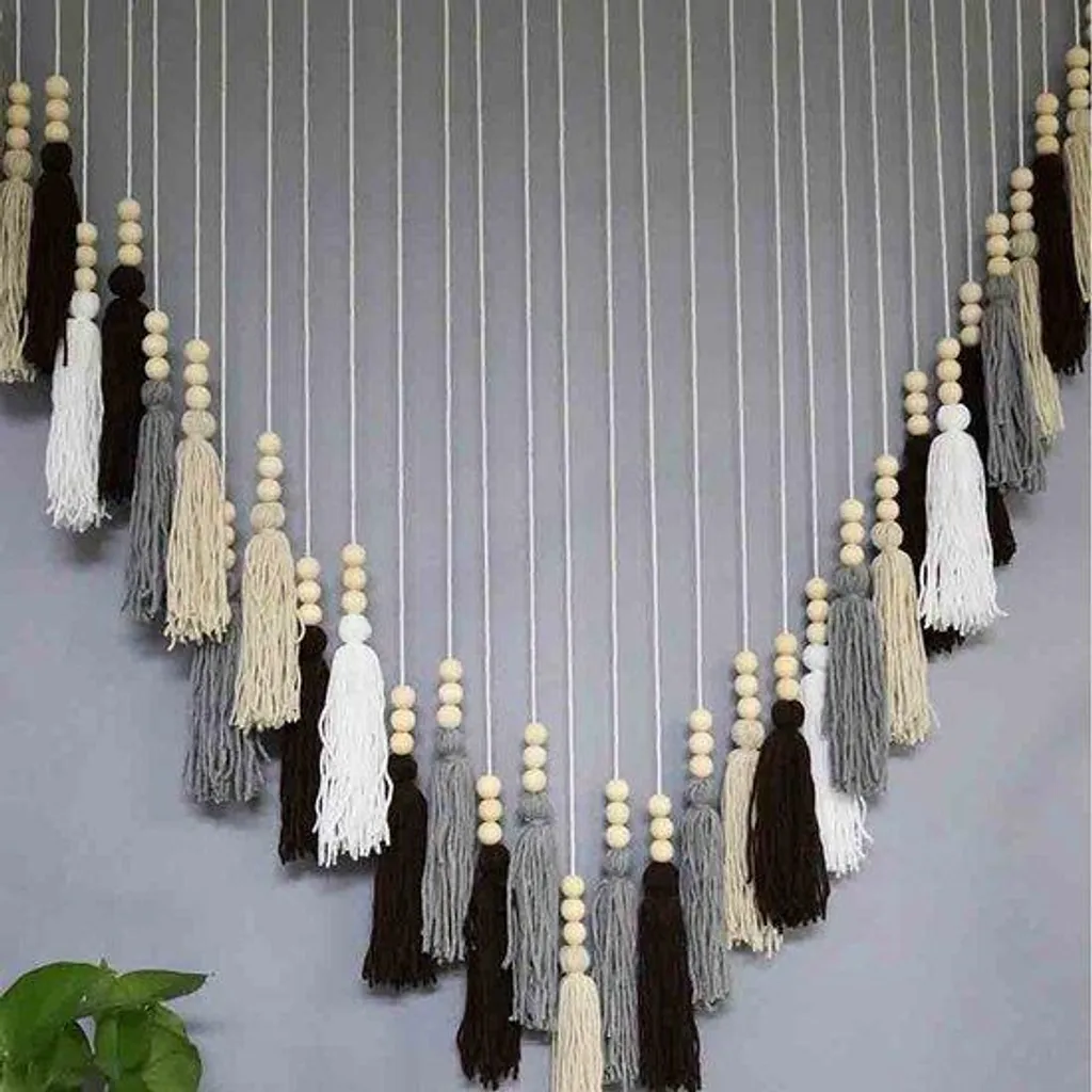 Déco murale bohème en bois : habillez vos murs vides avec ce macramé