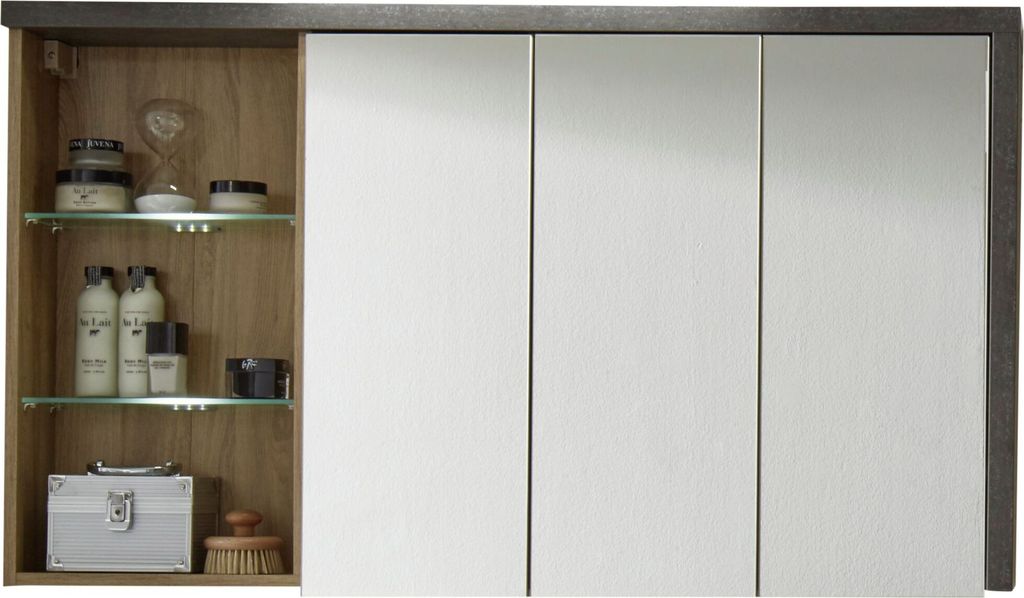 A bathroom medicine cabinet with mirrored doors and open shelving displaying toiletries.