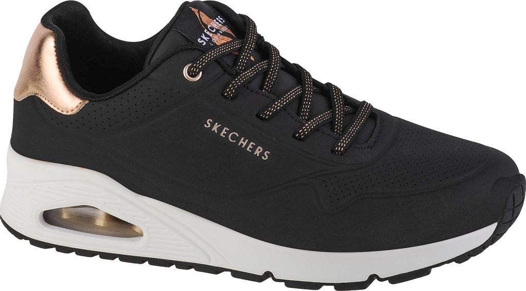 A side view of a black Skechers women's sneaker with rose gold accents.