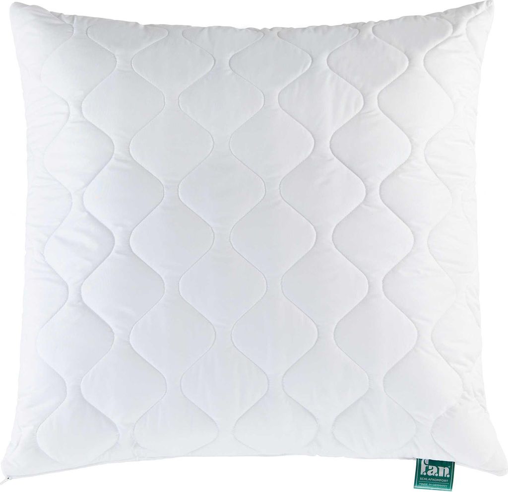 A white quilted pillow on a white background.