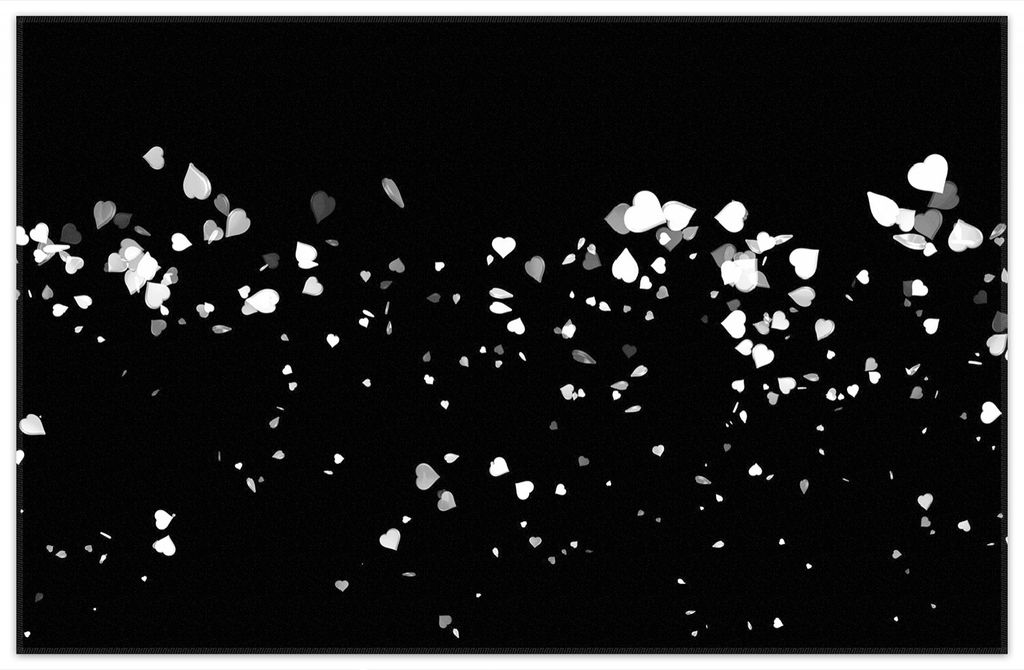 Wallario Premium Teppich, Größe 90 x 140 cm, Weiße Konfetti-Herzen vor schwarzem Hintergrund