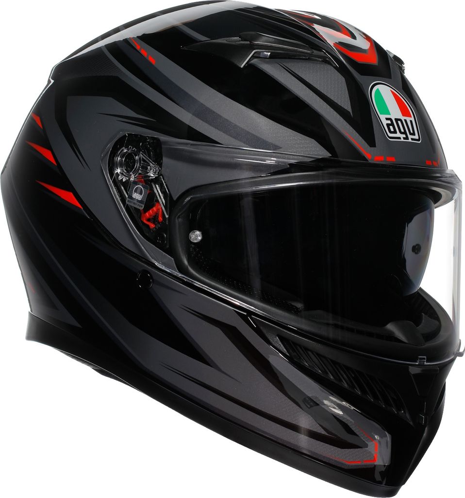 A black AGV K3 Integralhelm Syth motorcycle helmet with red and gray graphics, shown from a three-quarter angle against a white background.