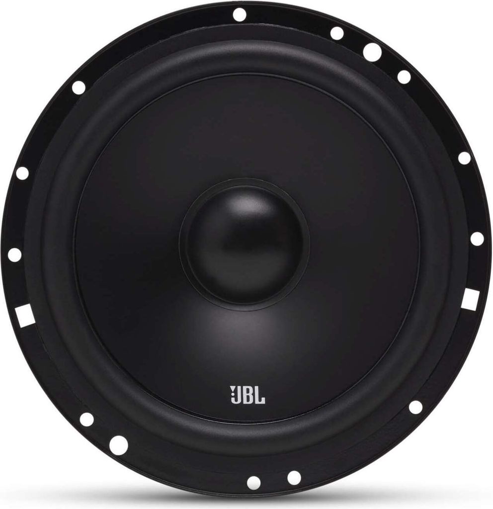A close-up, front-facing view of a black JBL speaker. The speaker has a prominent central cone and a textured outer rim with mounting holes. The JBL logo is visible in white on the lower part of the cone.