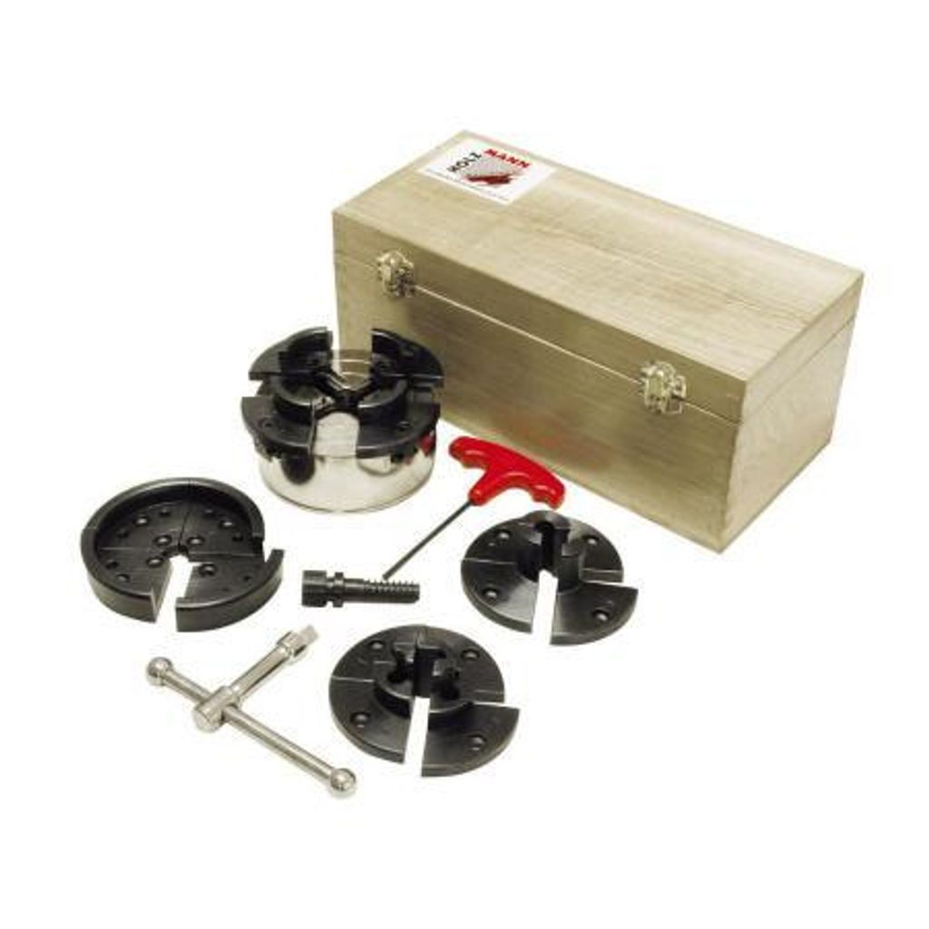 A set of woodturning chucks and accessories laid out on a white background, with a wooden storage box in the background.