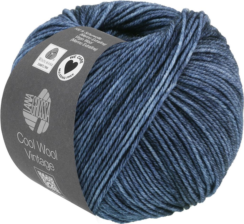 A ball of blue and gray variegated yarn with a label wrapped around it.
