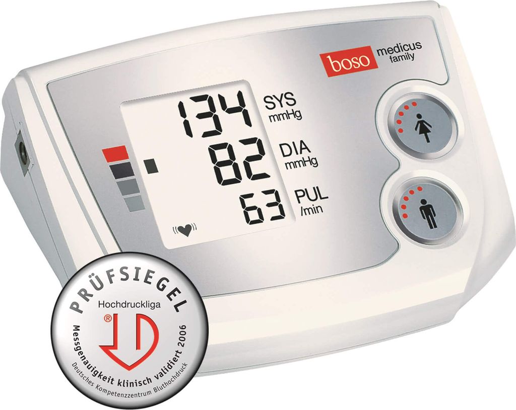 A white digital blood pressure monitor with a display showing readings and buttons for user selection.