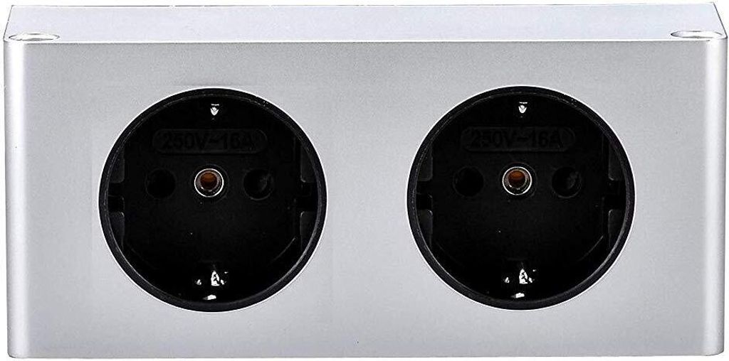 A close-up front view of a silver-colored power strip with two black electrical outlets.