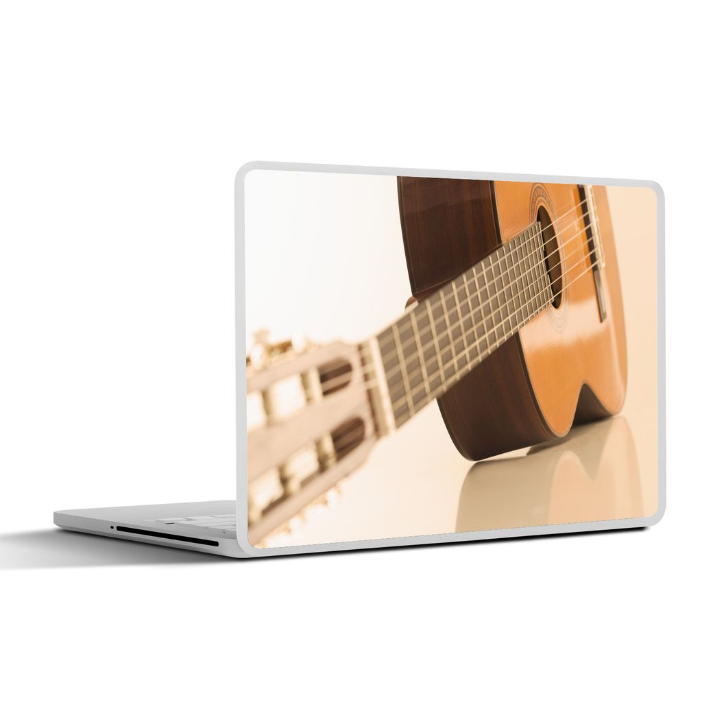 MuchoWow Laptop Aufkleber Sticker Cover Eine auf der Seite liegende akustische Gitarre 36.5x27.5 cm - Laptop-Sticker