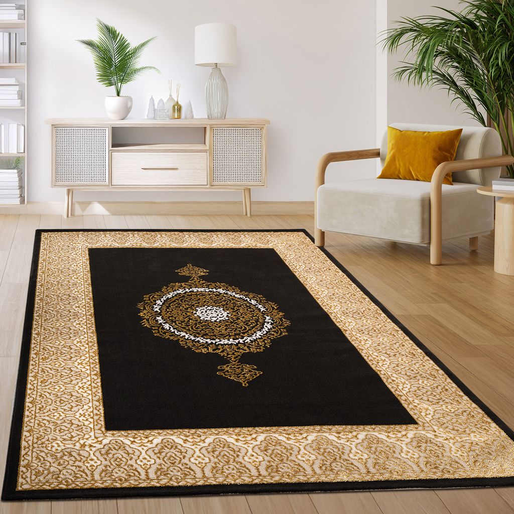 A living room with a rug, armchair, and cabinet.
