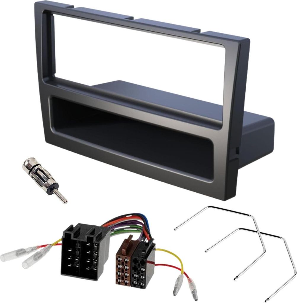 A car radio installation kit with a fascia adapter, wiring harness, antenna adapter, and release keys, laid out on a white background.