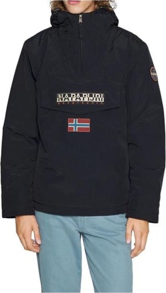 A person wearing a black Napapijri jacket and light blue pants.
