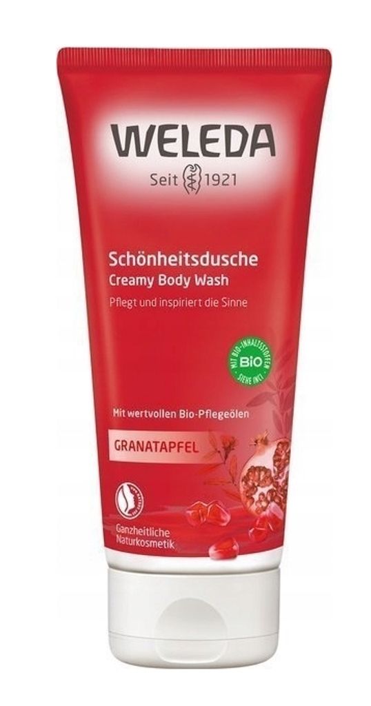 A red tube of Weleda Creamy Body Wash with pomegranate.