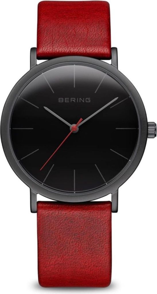 A close-up, front-facing studio shot of a Bering watch with a black face and red leather strap.