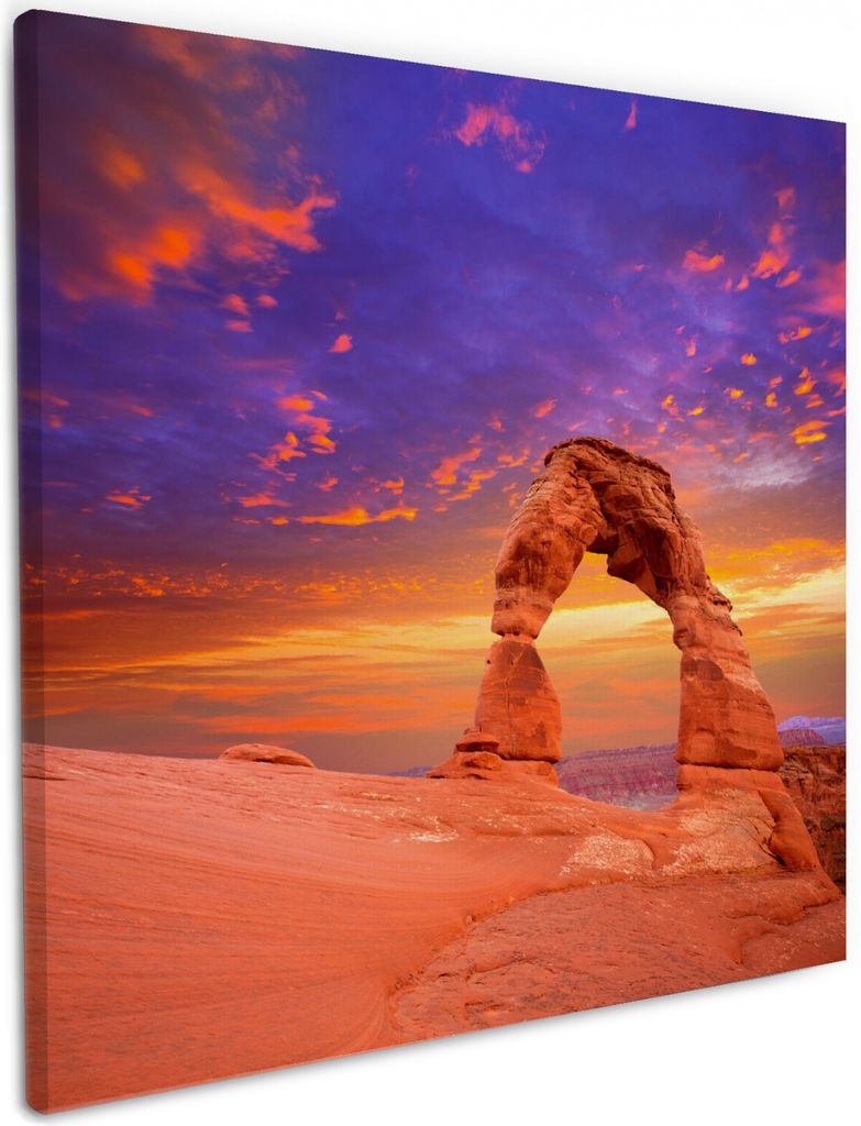 Wallario Premium Leinwandbild Steinbogen vor einem farbenfrohen Himmel in lila-rot in Größe 50 x 50 cm