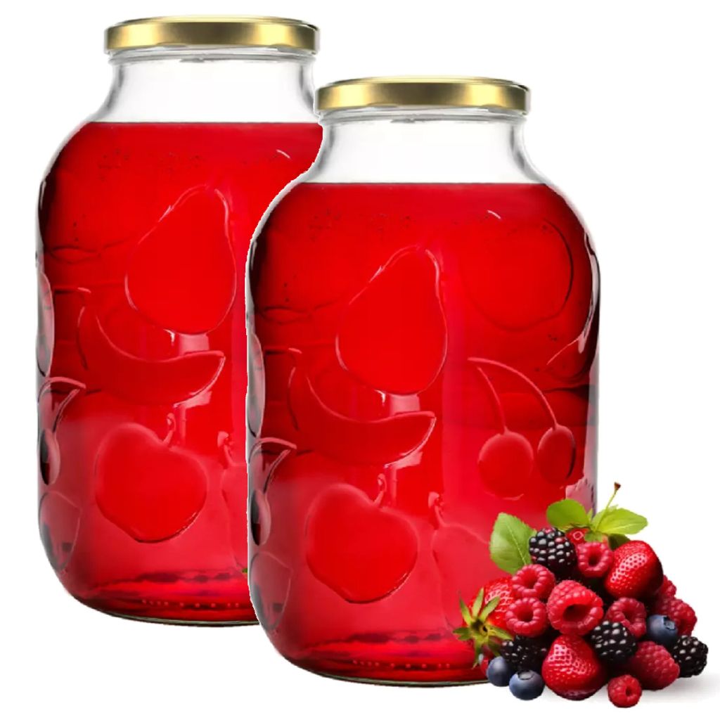 Two glass jars filled with red liquid, with a pile of mixed berries in the foreground.