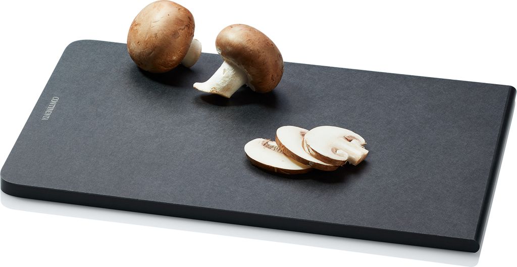 A dark cutting board with two whole mushrooms and three sliced mushrooms on it.