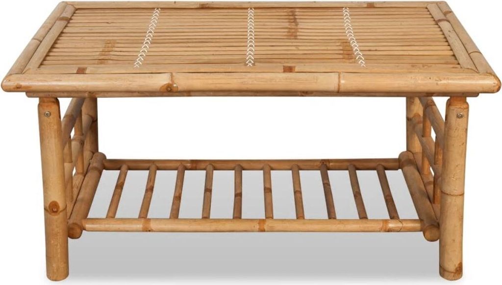 A front view of a bamboo coffee table with a lower shelf.
