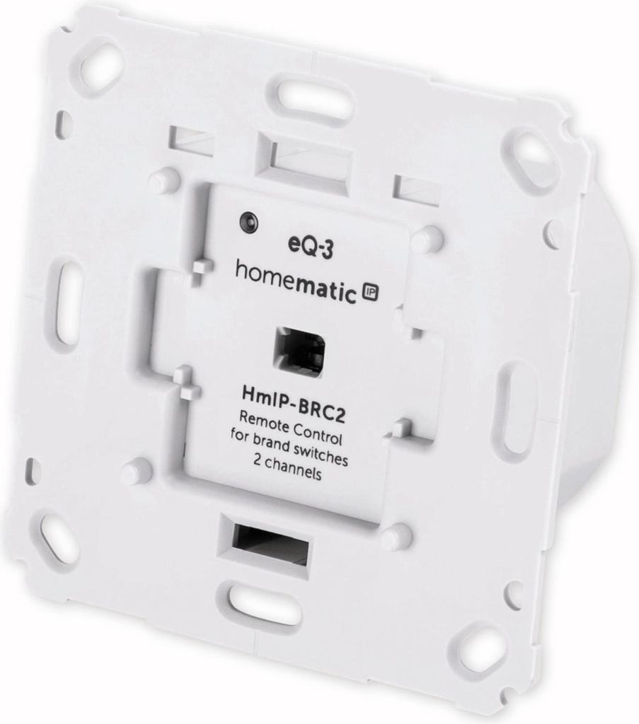 The back of a white Homematic IP Wandtaster HMIP-BRC2 for brand switches.