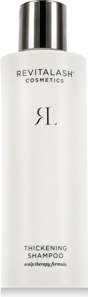A white bottle of RevitaLash Thickening Shampoo with a silver cap.