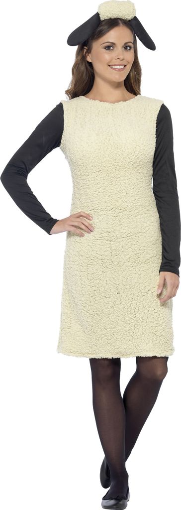 A woman is posing in a sheep costume.