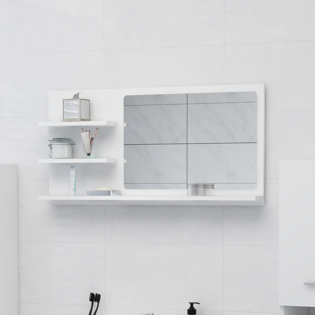 A white bathroom cabinet with a mirror and shelves, mounted on a tiled wall.