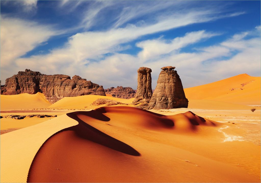 Wallario Poster - Felsen und Sand in der Sahara Wüste, Kunstdruck Größe: 70 x 100 cm
