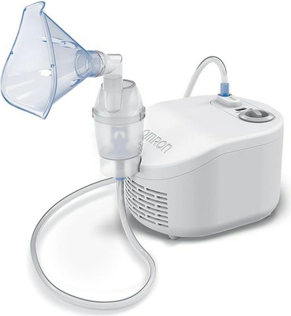 A white Omron C101 Essential nebulizer with its attached mask and tubing is shown against a white background.