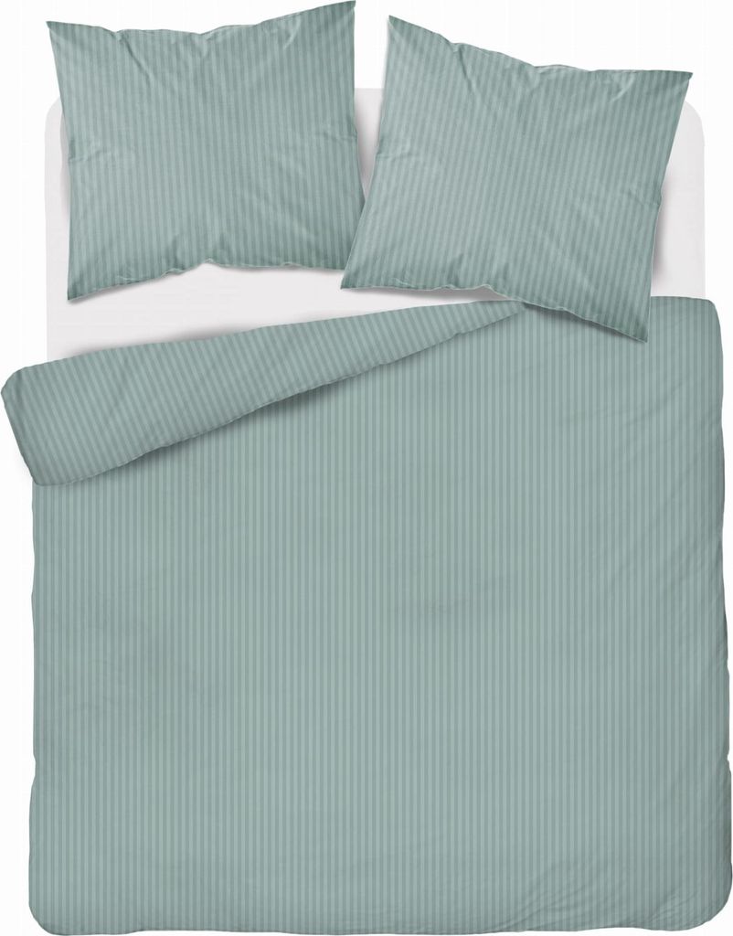 A neatly made bed with mint green striped bedding and two pillows.