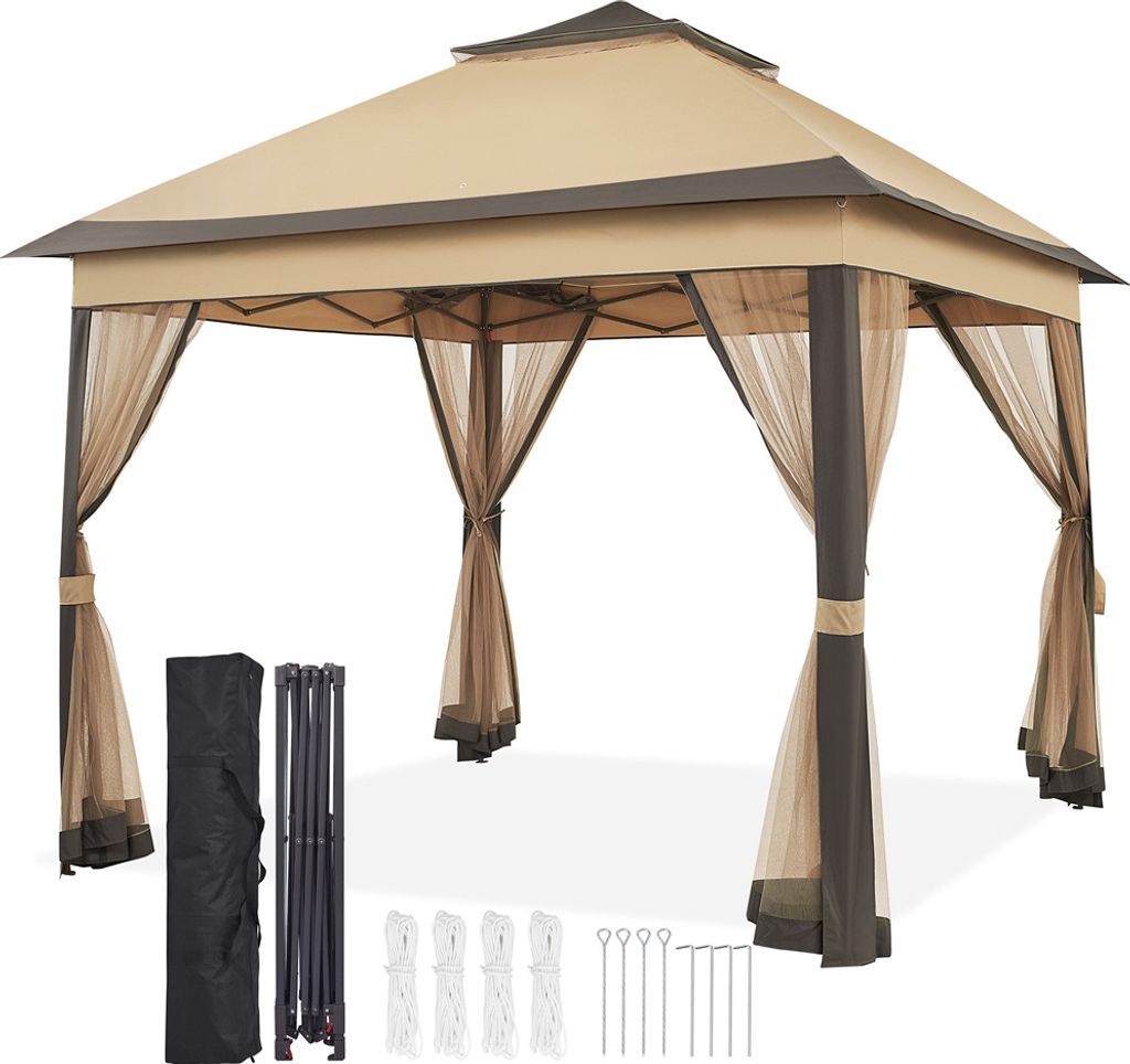 A pop-up gazebo with mesh curtains and accessories laid out in front of it.