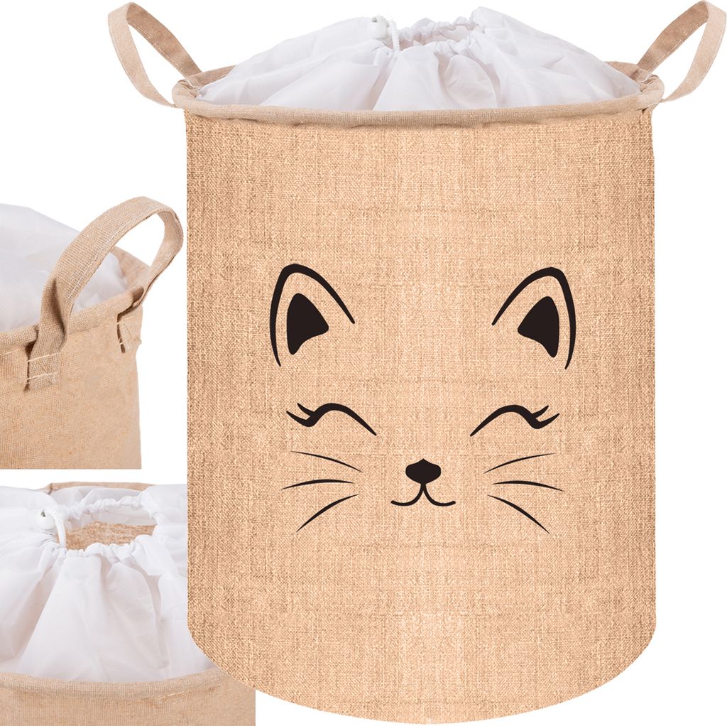 A laundry basket with a cat face design.