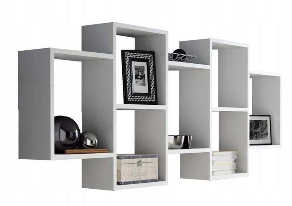 A white modular shelving unit filled with decorative items.