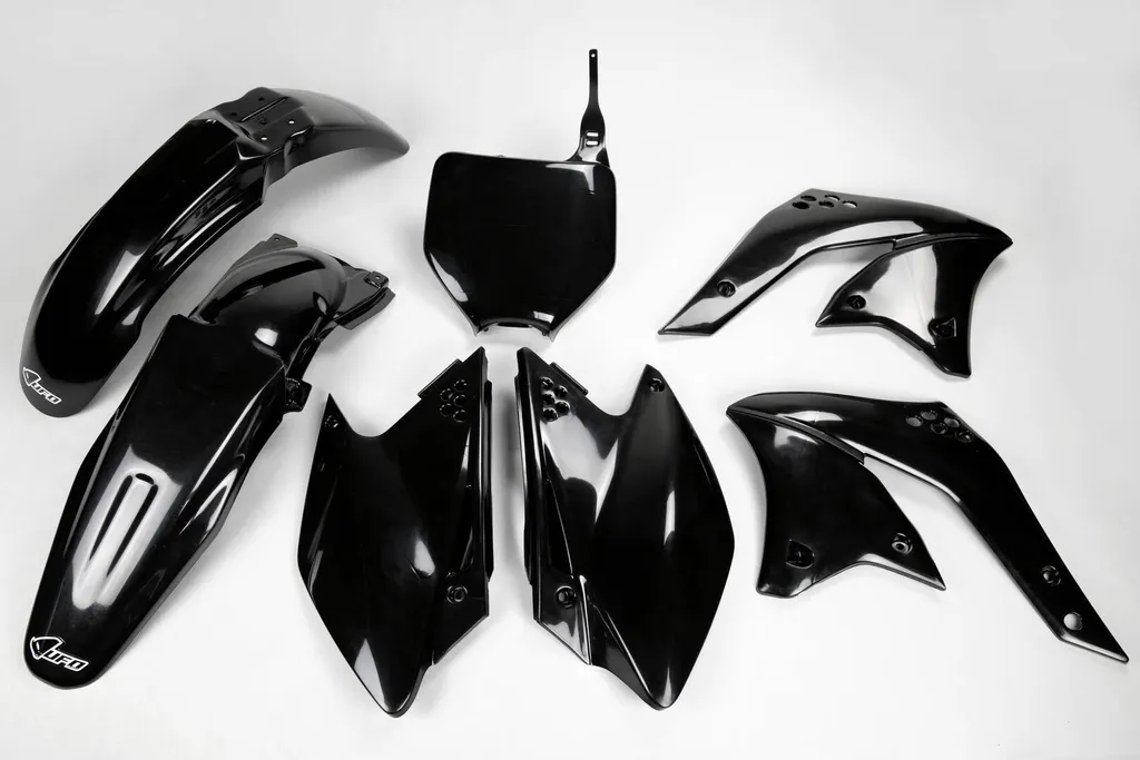 Remplacer plastiques cassés Kawasaki par kit UFO PLAST noir robuste