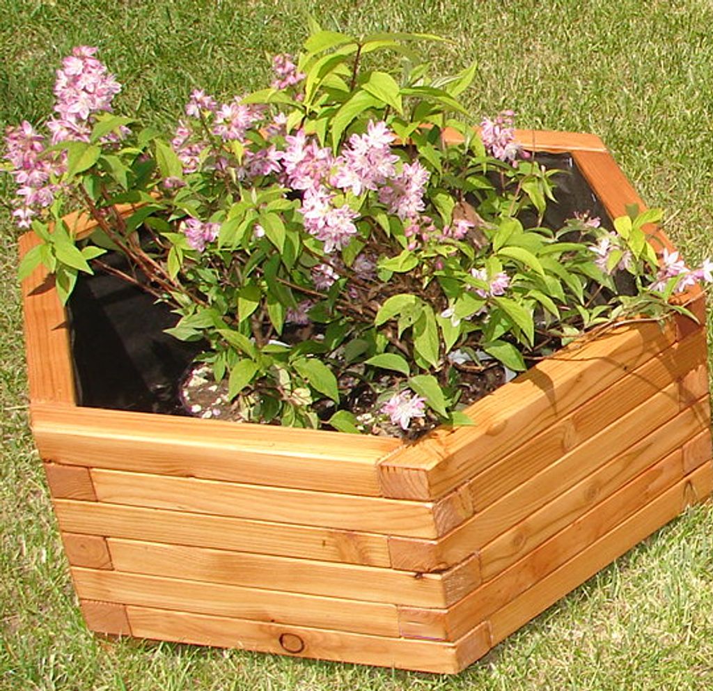 Pflanzkasten sechseckig Ø 80x31cm aus Lärche mit Vlies und Griffen