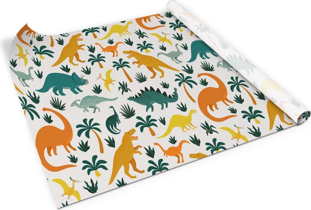 A roll of self-adhesive furniture film with a dinosaur pattern is shown from an angled perspective.