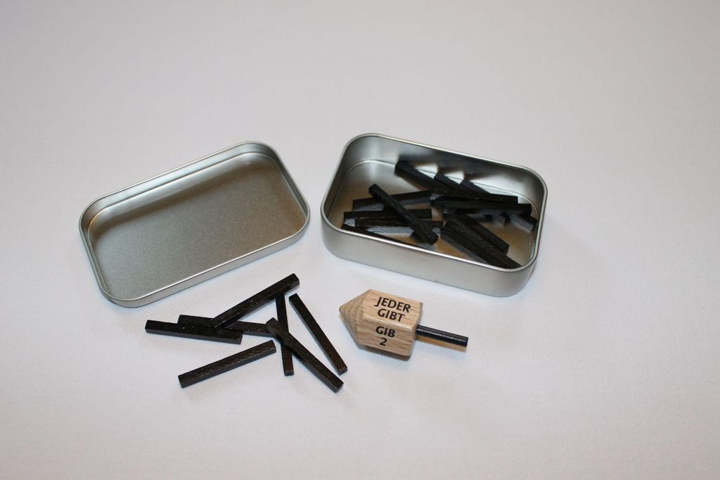 Holzspielzeug Kreisel-Spiel in Metallbox "Nimm-Gib"  BxHxT Produktbild 