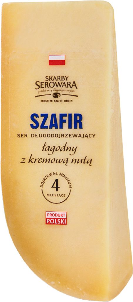 A wedge of cheese with a label on it.