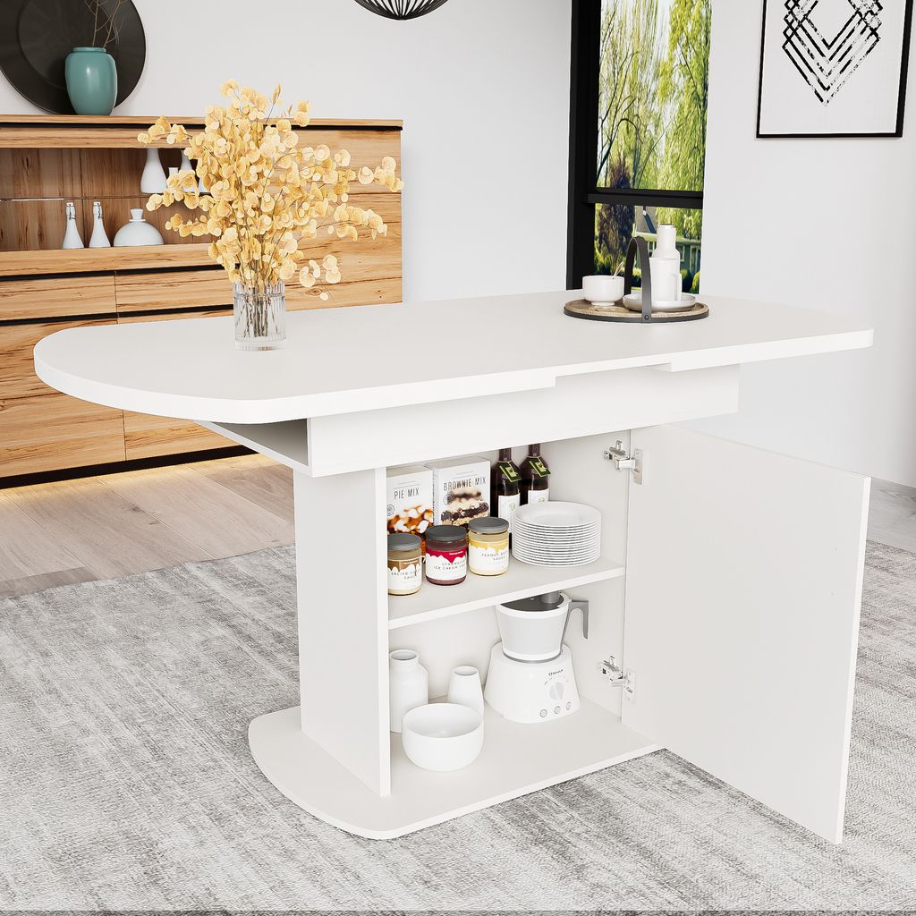 A white oval dining table with storage is shown in a room with a wooden cabinet and a window.