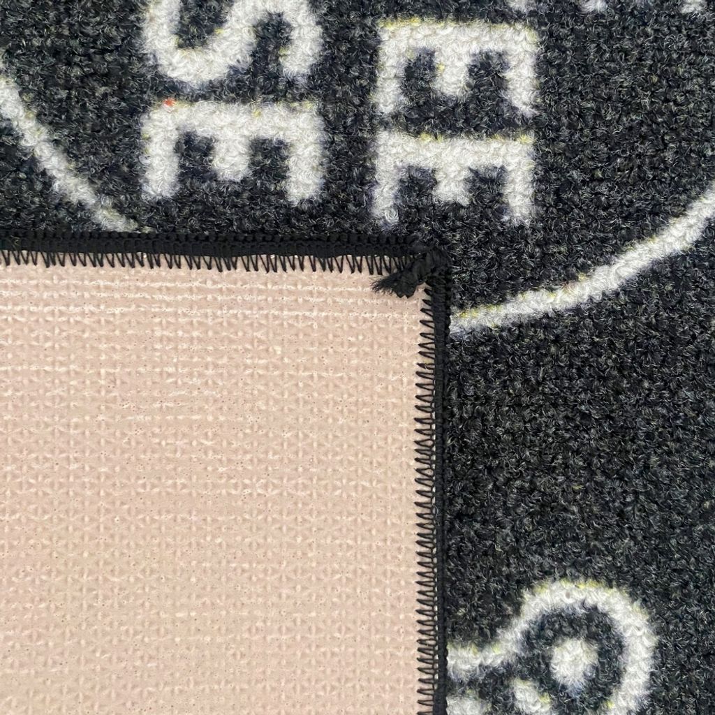 Küchenläufer schwarz mit Gelrücken und Schriftzug in weiß Produktbild 5