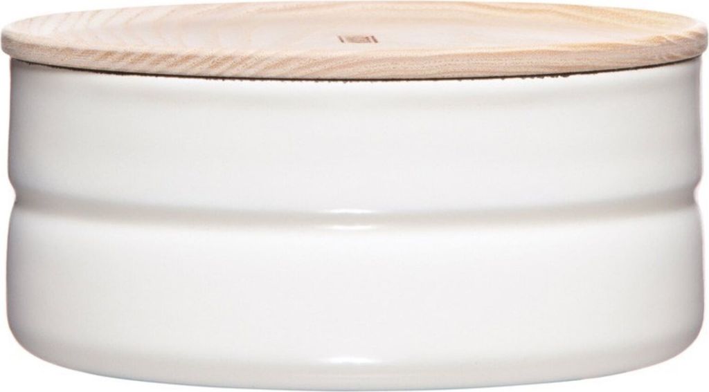 A white ceramic canister with a wooden lid.