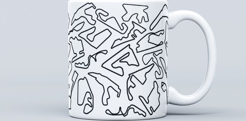 A white mug with a black outline pattern of race tracks.