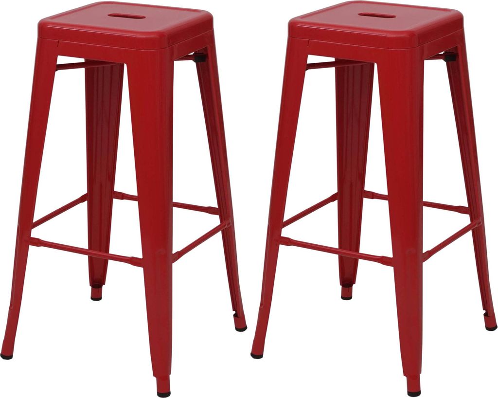 Two red metal bar stools are shown against a white background.