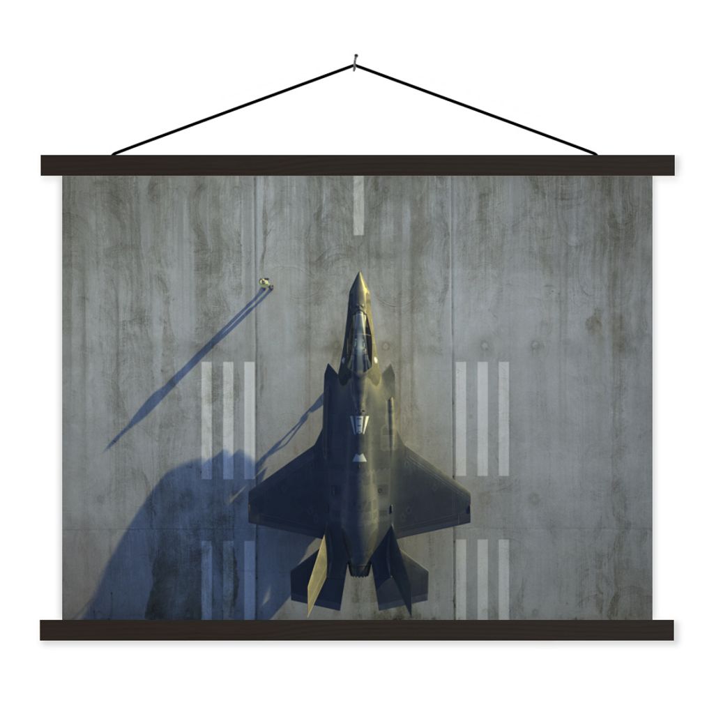 MuchoWow Textilposter Der F-35 Lightning II Jet auf dem Boden 150x113 cm mit schwarzem Rahmen - Wohnzimmer